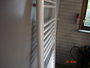 Badkamer radiator 133 cm hoog x 45 cm breed in het wit met 585 Watt_